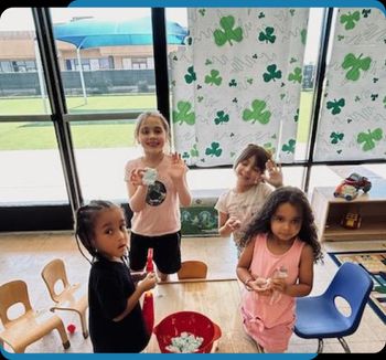 teacher and children learning while playing